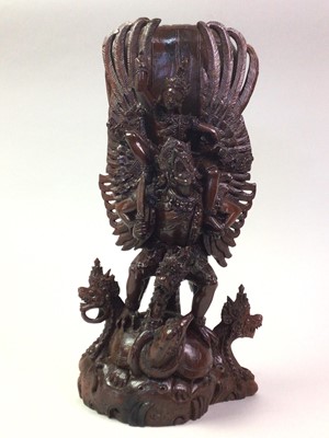 Lot 298 - HINDU HARDWOOD FIGURE GROUP VISHNU