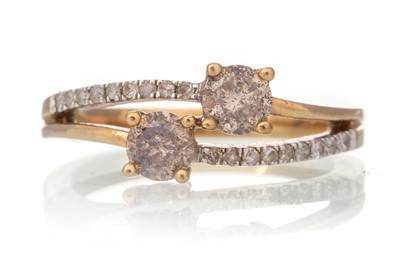 Lot 545 - DIAMOND TWO STONE CROSSOVER RING