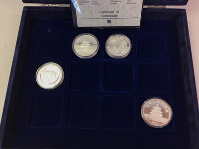 Lot 643 - FOUR CHINA FINE SILVER PANDA 10 YUAN COINS