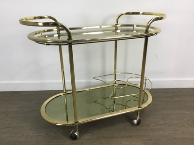 Lot 548 - ATTRIBUTED TO MILO BAUGHMAN, GILT METAL AND GLASS DRINKS TROLLEY