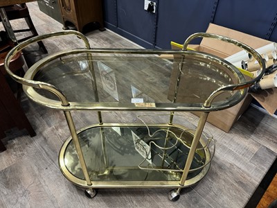 Lot 548 - ATTRIBUTED TO MILO BAUGHMAN, GILT METAL AND GLASS DRINKS TROLLEY