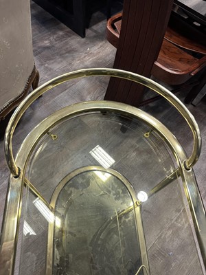 Lot 548 - ATTRIBUTED TO MILO BAUGHMAN, GILT METAL AND GLASS DRINKS TROLLEY