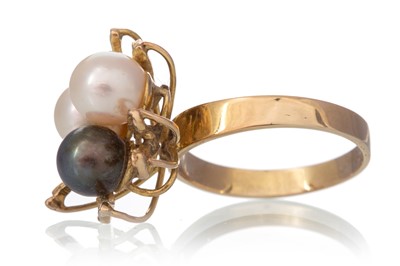 Lot 495 - PEARL THREE STONE RING
