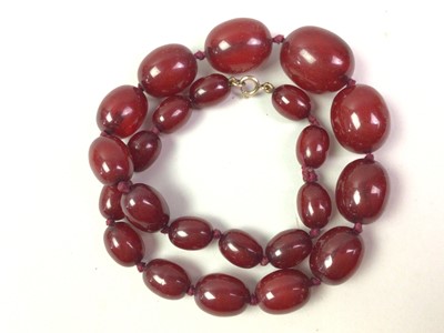 Lot 254 - CHERRY AMBER NECKLACE