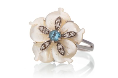 Lot 585 - MOTHER OF PEARL, TOPAZ AND DIAMOND FLOWER RING