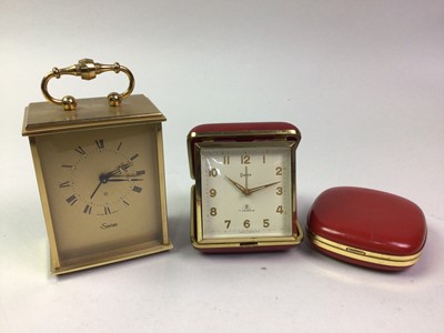 Lot 411 - ONYX AND BRASS MANTEL CLOCK