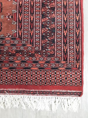 Lot 537 - EASTERN BORDERED RUG OF BOKHARA DESIGN