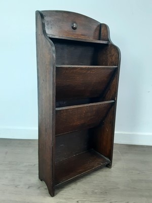 Lot 493 - OAK MAGAZINE RACK/BOOKCASE