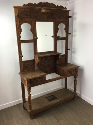 Lot 1434 - CARVED OAK MIRROR BACK HALLSTAND