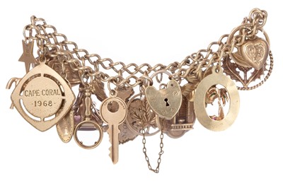 Lot 587 - GOLD CHARM BRACELET