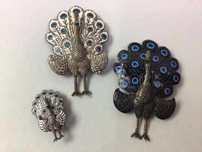 Lot 91 - TWO SIAM SILVER AND ENAMEL PEACOCK BROOCHES