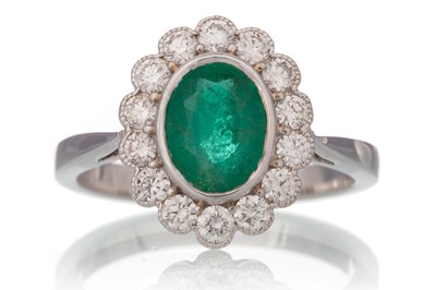 Lot 517 - EMERALD AND DIAMOND CLUSTER RING