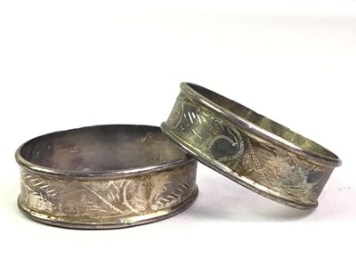 Lot 189 - ELIZABETH II PART SET OF FIVE SILVER NAPKIN RINGS