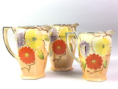 Lot 466 - SET OF THREE ARTHUR WOOD GRADUATED WATER JUGS