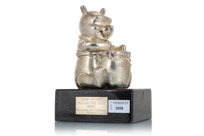 Lot 1058 - SILVER WINNIE THE POOH SEATED FIGURE - HUNNY