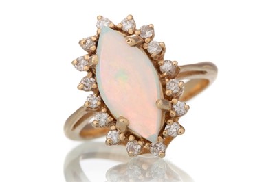 Lot 706 - OPAL AND DIAMOND RING