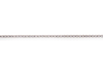 Lot 404 - DIAMOND TENNIS BRACELET