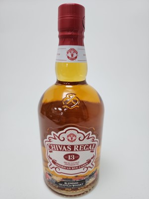 Lot 435 - CHIVAS REGAL 13 YEAR OLD MANCHESTER UNITED 75CL AND 12 MATCHING MINIATURES