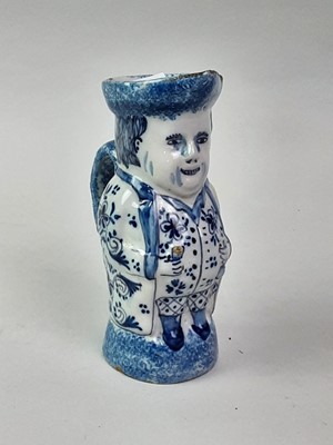 Lot 744 - DELFT BLUE AND WHITE CHARACTER JUG