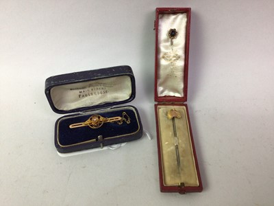 Lot 144 - NINE CARAT GOLD DIAMOND SET BAR BROOCH