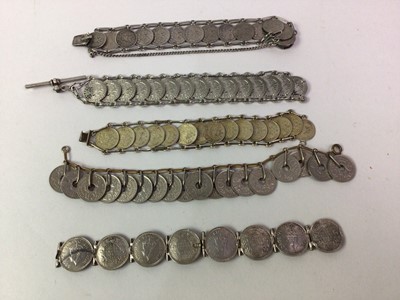 Lot 186 - SEVEN COIN SET BRACELETS