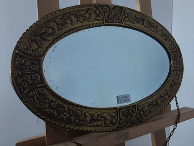 Lot 220 - BRASS OVAL WALL MIRROR