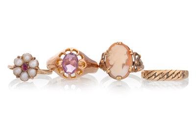 Lot 517 - FOUR GOLD DRESS RINGS