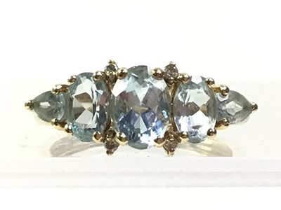 Lot 285 - NINE CARAT GOLD AQUAMARINE & DIAMOND RING