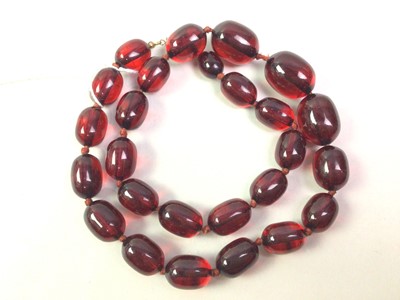 Lot 286 - SET OF CHERRY BAKELITE BEADS