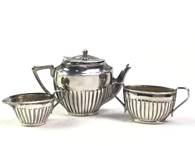 Lot 287 - MINIATURE SILVER THREE-PIECE TEA SERVICE