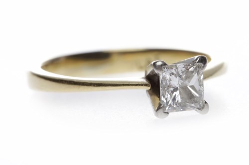 Lot 31 - DIAMOND SOLITAIRE RING the four claw set...
