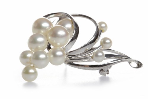 Lot 42 - MIKIMOTO SILVER PEARL SET BROOCH openwork and...