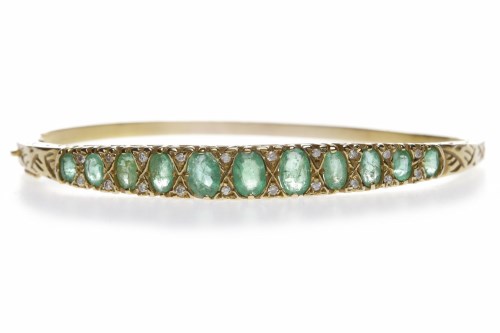 Lot 58 - VICTORIAN STYLE EMERALD BANGLE set with...
