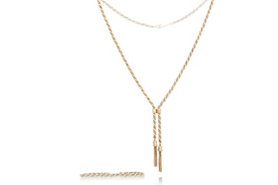 Lot 514 - GOLD TASSEL NECKLACE AND A BRACELET