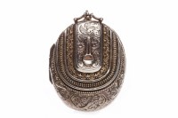 Lot 125 - VICTORIAN SILVER LOCKET of oval form, with...