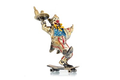 Lot 1104 - SILVER AND ENAMEL MINIATURE FIGURE