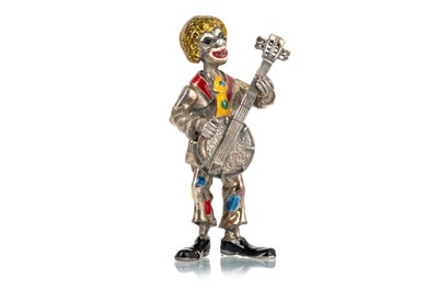 Lot 1129 - SILVER AND ENAMEL MINIATURE FIGURE