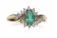 Lot 142 - EMERALD AND DIAMOND RING the oval emerald 7mm...