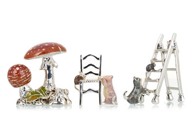 Lot 1148 - THREE SILVER AND ENAMEL MINIATURE FIGURES