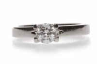 Lot 182 - DIAMOND SOLITAIRE RING the four claw set round...