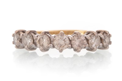 Lot 594 - DIAMOND SEVEN STONE RING