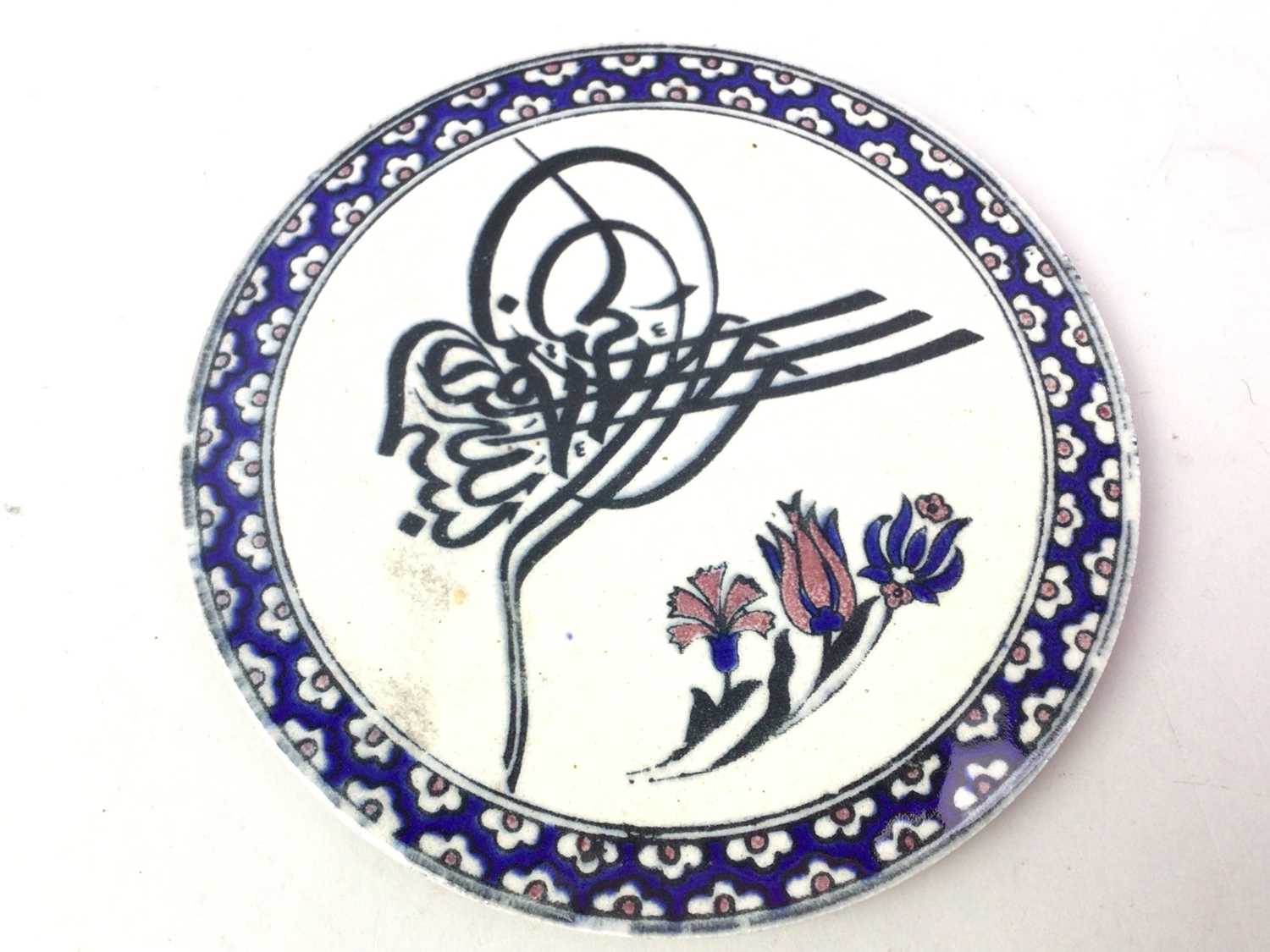 Lot 312 - CIRCULAR CERAMIC TILE