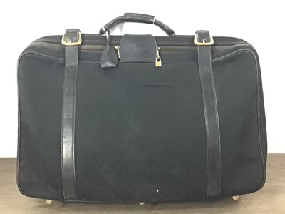 Lot 1488 - GUCCI, BLACK LEATHER AND MONOGRAM SUITCASE