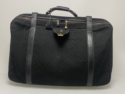 Lot 937 - VINTAGE 1980S GUCCI, BLACK LEATHER AND MONOGRAM SUITCASE