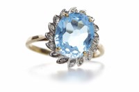 Lot 233 - TOPAZ AND DIAMOND CLUSTER RING the central...