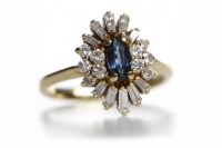 Lot 235 - BLUE AND WHITE GEM SET CLUSTER RING the...