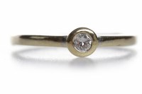Lot 239 - DIAMOND SOLITAIRE RING the collet set round...