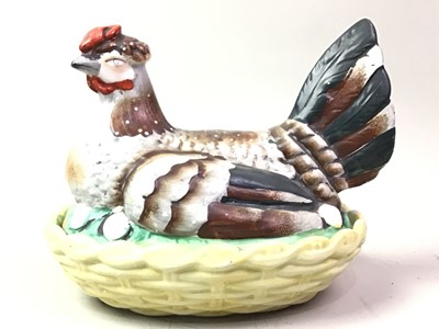 Lot 105 - CERAMIC HEN EGG BASKET