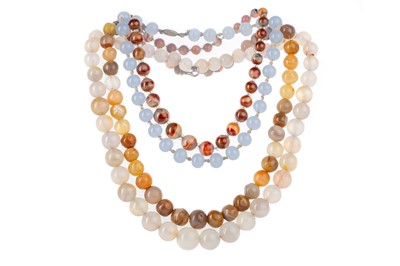 Lot 1127 - FOUR AGATE NECKLACES