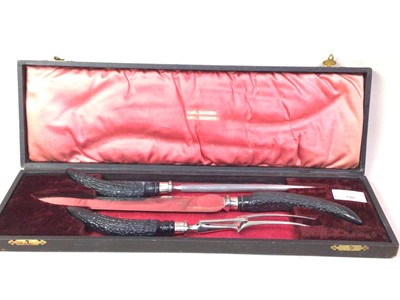 Lot 290 - TWO CARVING SETS